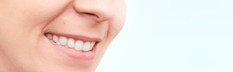 Smiling woman mouth with white teeth