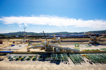 The territory of the marine coal terminal. Construction site of a coal terminal. Warehouse with...