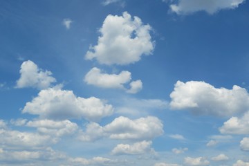 Naklejka na ściany i meble Blue sky with beautiful fluffy clouds, natural background