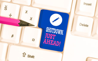 Writing note showing Shutdown Just Ahead. Business concept for closing factory business either...