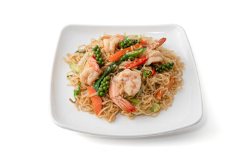  Stir-fried instant noodles with fresh shrimps and herb isolated on white background, Spicy mama salad with shrimp, Thai Mama Instant Noodles, Spicy noodle, Thai food.