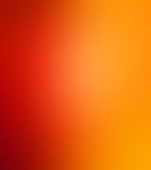 Bright blurred red orange background in warm autumn colors for halloween or thanksgiving designs