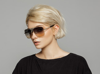 Portrait of blond woman in sunglasses
