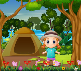 Cute little girl camping out by the river landscape