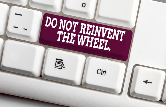 Word writing text Do Not Reinvent The Wheel. Business photo showcasing stop duplicating a basic method previously done White pc keyboard with empty note paper above white background key copy space