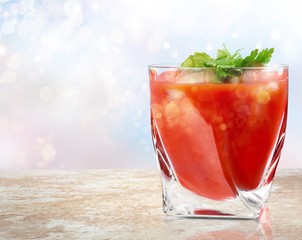 Glass of alcohol cocktail on white background, bloody Mary.