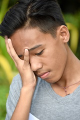 A Depressed Handsome Teen Boy