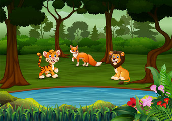 Obraz na płótnie Canvas Cartoon many wild animals in the forest