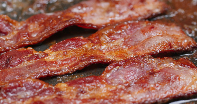 Cook with bacon on fry pan