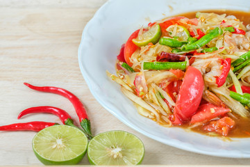 Spicy papaya salad in Thai style food