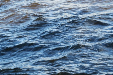 Waves on river water surface, natural background