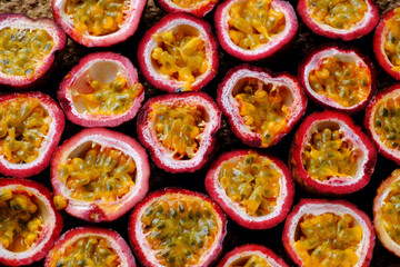 Top view passion fruits cut in half background