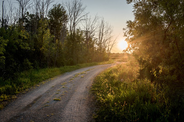 Fototapeta na wymiar gravel road at sunset