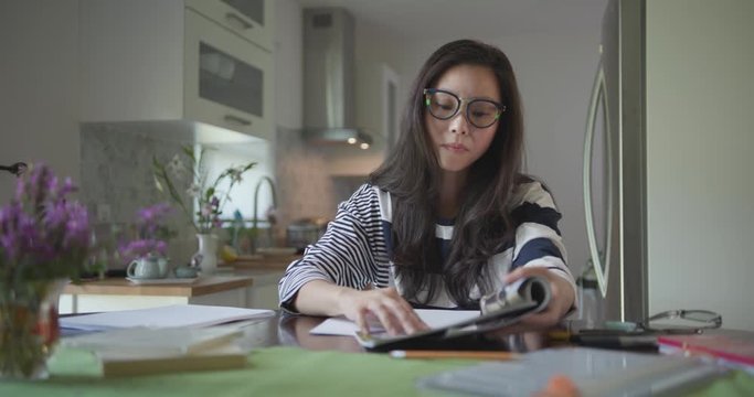 A fashion designer is drawing a new line