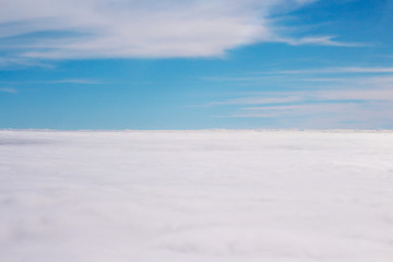 Fototapeta na wymiar White clouds view on bright blue sky background , copy space