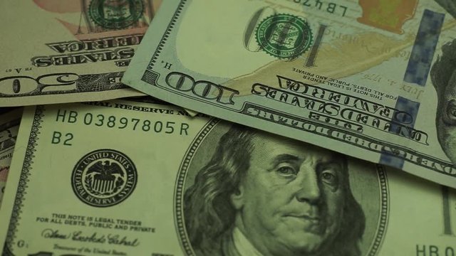 Dollars Close up Concept. American Dollars Cash Money background. Macro view.  Rotation 360 degrees.