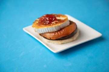 Goat cheese with mushroom and tomato, typical Spanish tapa