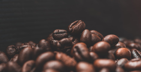 Roasted coffee beans with dark background