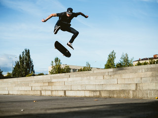 Skateboarder doing a trick on the skateboard