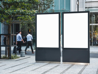 Mock up Signboard stand Media set outdoor Public building with people walking Business district