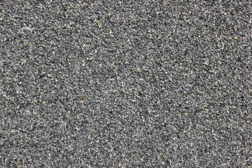 Light grey gravel floor texture, top view. Asphalt texture. 