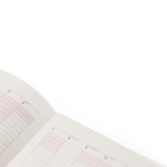 The calendar in the notebook on white background