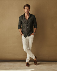 Handsome man in fashionable outfit