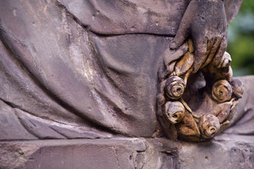 Fototapeta na wymiar Sculpture of Angel at a Prague cemetery. Czech Republic. Sculpture elements.