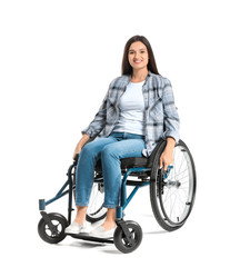 Obraz na płótnie Canvas Beautiful woman in wheelchair on white background