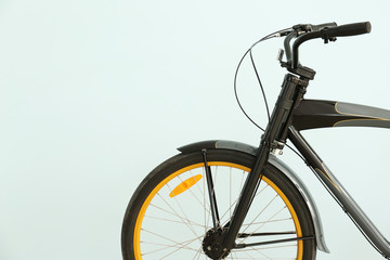 Fototapeta na wymiar Modern bicycle on light color background