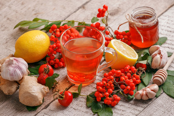 Hot drink, tea with ginger, lemon, honey. Winter healthy tea for immunity boosting and treatment of colds, seasonal fall autumn beverage, alternative meidicine remedy