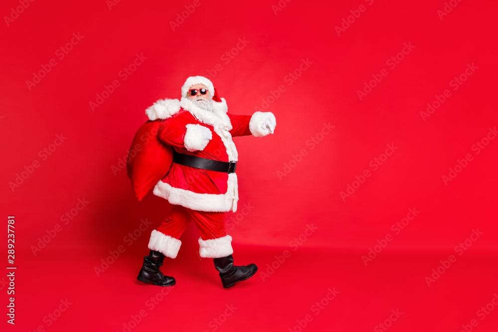 Sticker Full length body size view of his he funky fat overweight plump gray-haired bearded man piggy backing gifts fairy going to children house home isolated over bright vivid shine red background