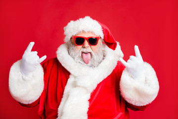 Close-up portrait of his he nice attractive positive playful bearded Santa having fun leisure...