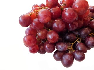 red grapes isolated on white background.