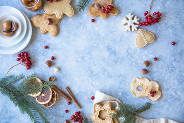 New Year and Christmas background. Christmas candy cane gingerbread on blue  background. New Year and Christmas composition, free space for text, New year and Christmas still life