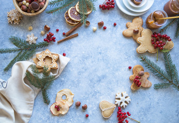 New Year and Christmas background. Christmas candy cane gingerbread on blue  background. New Year and Christmas composition, free space for text, New year and Christmas still life