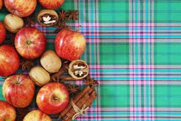 Bright ripe apples forming autumn mood background for design and decoration