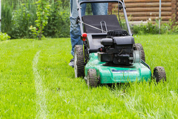 Man with lawn mower