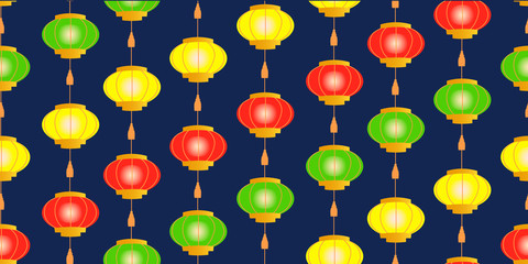 Chinese lanterns red, yellow and green on a dark blue background