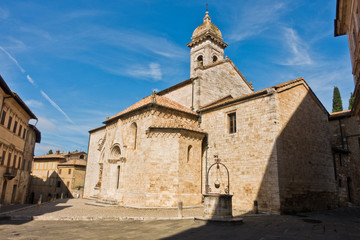 Fototapeta na wymiar San Quirico church at sunny morning in San Quirico d'Orcia , Siena province, Tuscany, Italy