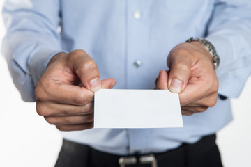 Asian man holding a blank card.