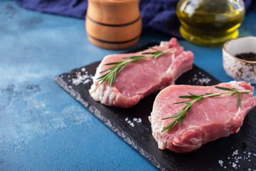 Uncooked pork chop steak. Copy space
