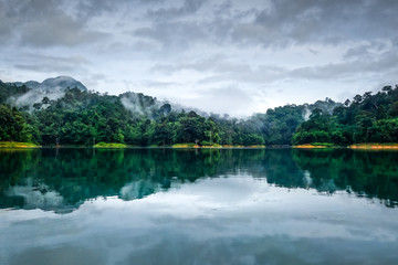 Misty morning on Cheow Lan Lake, Khao Sok National Park, Thailand