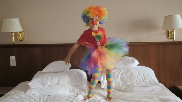 Happy Clown Little Girl Dancing And Have Fun In the Bedroom. Little Child Clown Enjoying Dance, Having Fun Together, Party. Floss Dance Viral, Flossing.