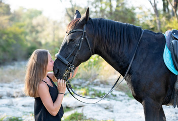 Obraz premium riding girl and horse