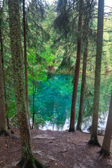 Mystically turquoise coloured spring Kiikunlahde in Hollola, Finland