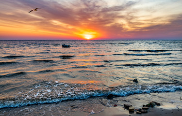 Coastal landscape on sandy beach of the Baltic sea at dawn