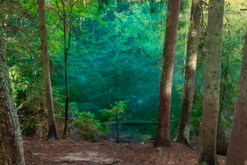 Mystically turquoise coloured spring Kiikunlahde in Hollola, Finland