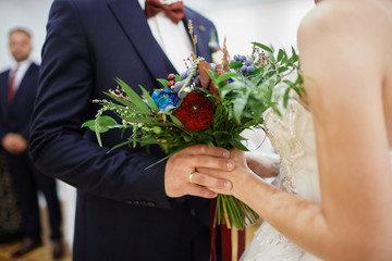 man and woman holding hands