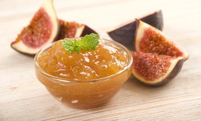 figs jam on a wooden background